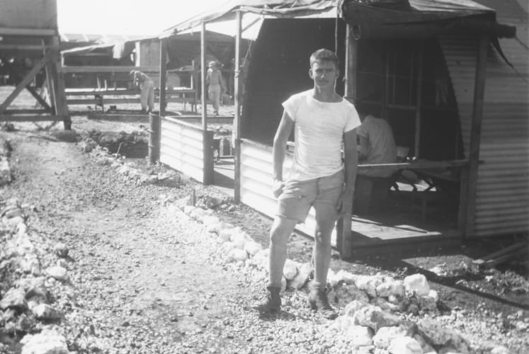 Harold Kimme by his living quarters on Tinian. Courtesy of the Joseph Papalia Collection.